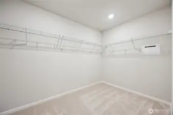 Spacious primary closet. Picture for representational purposes only, colors and features may vary.