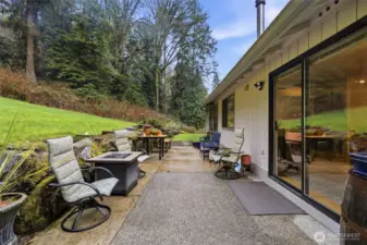 Patio just off the dining area, accessed through sliding doors for easy indoor-outdoor connection.