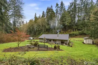 Back of home with spacious yard and no close neighbors, offering a rare sense of privacy in Edmonds.