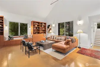 To the right of the entry, the living room