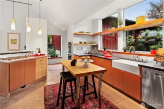 Bright, airy kitchen with SS appliances, gas cooktop