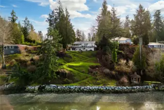 This gem sits on an amazing 80' of waterfront, boasting a beautiful granite bulkhead and overlooking Henderson Bay in the glorious Pacific Northwest!