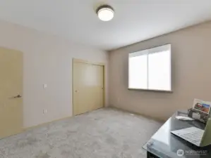 Office/ bedroom with closet.
