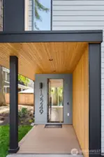 Tongue and Groove Covered Entry with Poured Concrete Porch
