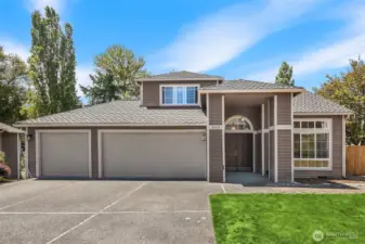 Lovely home on a cul-de-sac with 3 car garage and ample driveway parking