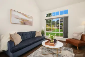 Bright and airy living room with soaring ceilings and lots of natural light