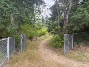 Gate to the back section of the lot