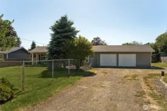 Oversized 2-car garage and circular driveway.