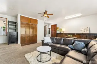 Another view of the bonus room and door to the garage.