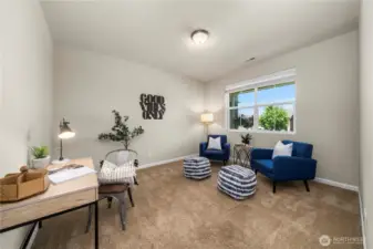 Large den/ office to the right of the front door.