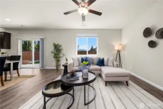 Exit sliding glass doors to a private and tranquil backyard.