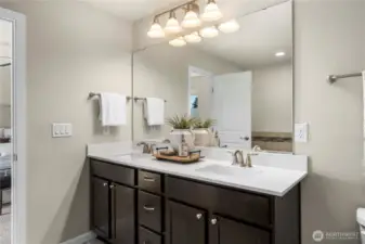Two sinks in the primary en suite.