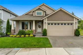 Welcome to the perfect place to call home! This inviting Craftsman-style residence boasts charming curb appeal with its front porch, tidy landscaping, and warm, welcoming design. It is adjacent to a resource parcel and a planting strip behind the home provides added privacy.