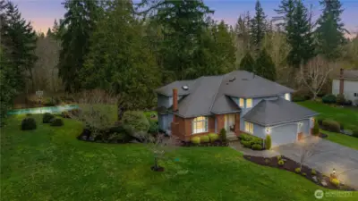 Welcome home to a beautifully landscaped exterior, complete w/ your own private sport court