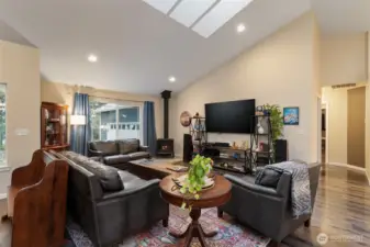 Oversize windows and wood stove for added coziness.