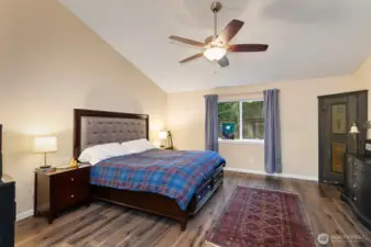Primary suite fits a King bed and tons of furniture. Overlook the acreage out the back.