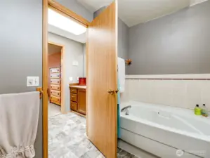 Primary ensuite with private soaking tub.