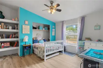 Light, bright bedroom with built-ins