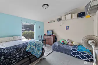 Primary bedroom with vaulted ceilings, large picture window and vaulted ceilings in 2nd home