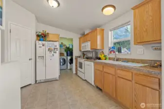 Light, bright kitchen in 2nd home with pantry