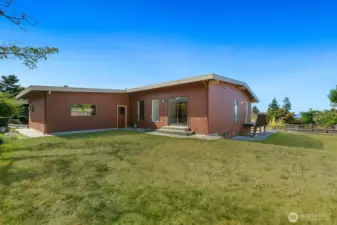 The 7,800 SF lot has a nice big yard ready for what your heart desires.  You can put in a swimming pool or DADU.  There is good access from the driveway side of the home for where you would locate a DADU.