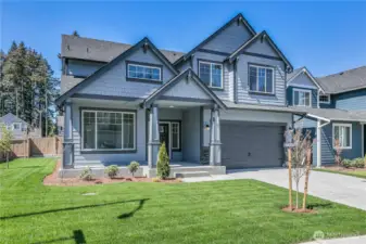 **This home is under construction** Photos are of same plan in the community. Colors and features will vary.