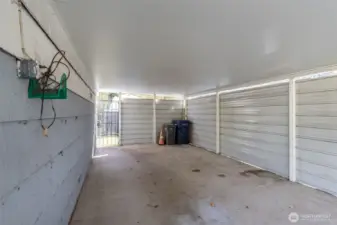 Lots of space in the carport for cars or storage.
