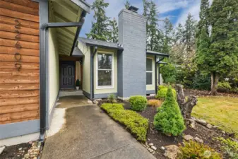 Step into a warm and inviting entry that immediately sets the tone for this thoughtfully updated home. Mid century modern comfort meets timeless style in every detail.