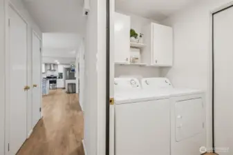 A practical, in-home laundry space makes daily chores easier. Clean, functional, and perfectly placed with walk-through to the garage.