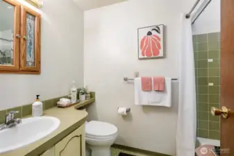 Full bath is across from the 2 bedrooms on main