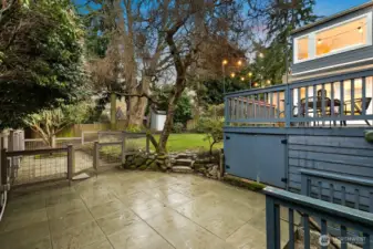 Enjoy an expansive deck, patio, dog run (or place to make your dream garden) and tons of grass!