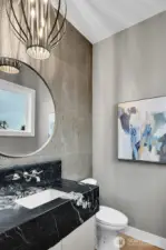 Lovely main floor powder room with designer touches