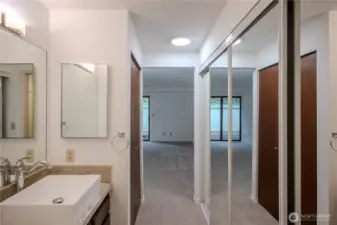 Primary ensuite bathroom with closet