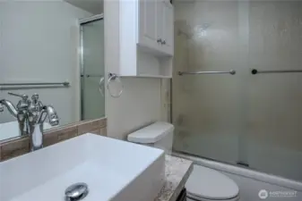 Second bathroom with full tub and shower