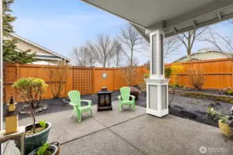 Large covered patio with views of professional landscaping