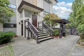 Welcome Home! Entrance from Street and Community Courtyard with Mailboxes nearby.