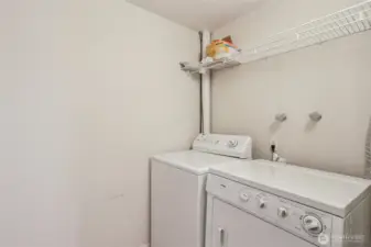 Utility Room complete with Washer and Dryer