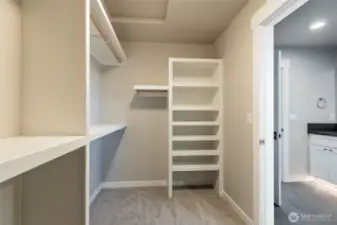 Custom build shelves in primary closet of like home