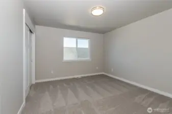Large guest bedrooms in upper level of like home.