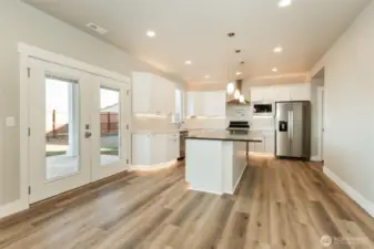 Kitchen and entrance to rear patio of like home