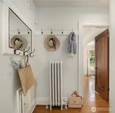 This is the back hallway, the door leads out to the front rooms, and not in the photo is the staircase to the second story.