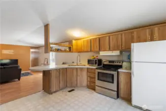There is plenty of cabinet space in this generous sized kitchen