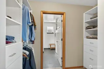 Looking through the Walk In closet towards the bathroom.