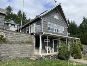 From the dock. 2-story house, shop and garage above.