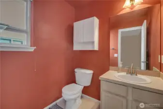 The powder room is located on the lower level.