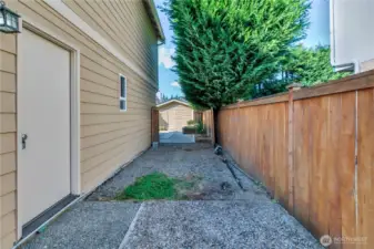Along the side of the house are two sets of double gates which makes it very easy to move larger items to the back yard and a wonderful place to store all of your toys and other outdoor items!