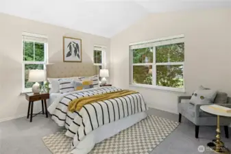 Upstairs, the north bedroom has a vaulted ceiling and a huge walk-in closet.