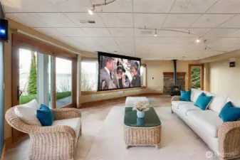 Virtually Staged, projector screen retracts into ceiling.