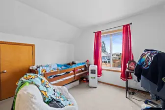 Large bonus room or possible additional bedroom.