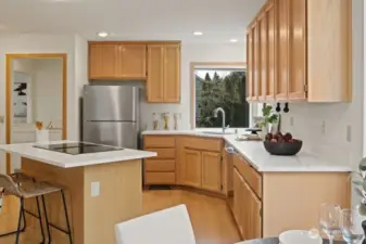 Beautiful Quartz Counters and Wood Cabinets